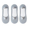 Three pairs of gray silicone grip no-show socks shown from the sole view.