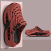A pair of terracotta-colored men's EVA slip-on sandals with a cushioned platform sole shown in a vertical view.