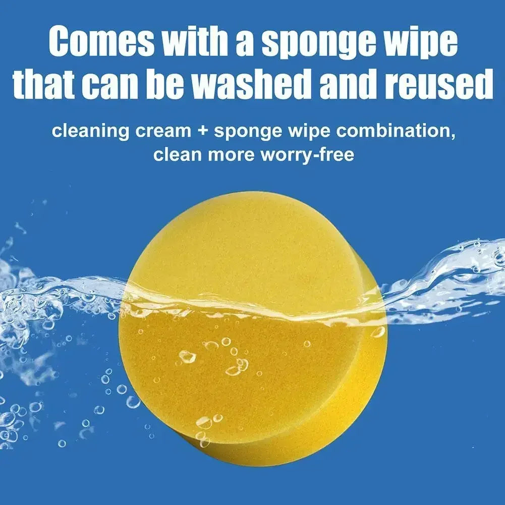 A round yellow cleaning cream product is shown being washed with water, surrounded by splashing liquid.