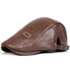 A brown faux leather newsboy cap with a textured finish and adjustable strap is shown from the side.