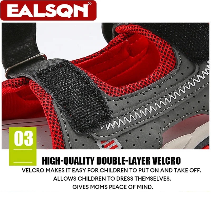 Close-up of a gray and red children's sandal featuring a black double-layer velcro strap for easy dressing.