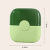 A green and lime yellow 2-in-1 manual hair trimmer comb for baby and adult.