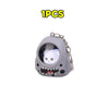 A gray silicone keychain featuring an astronaut charm and a cute white bear face.