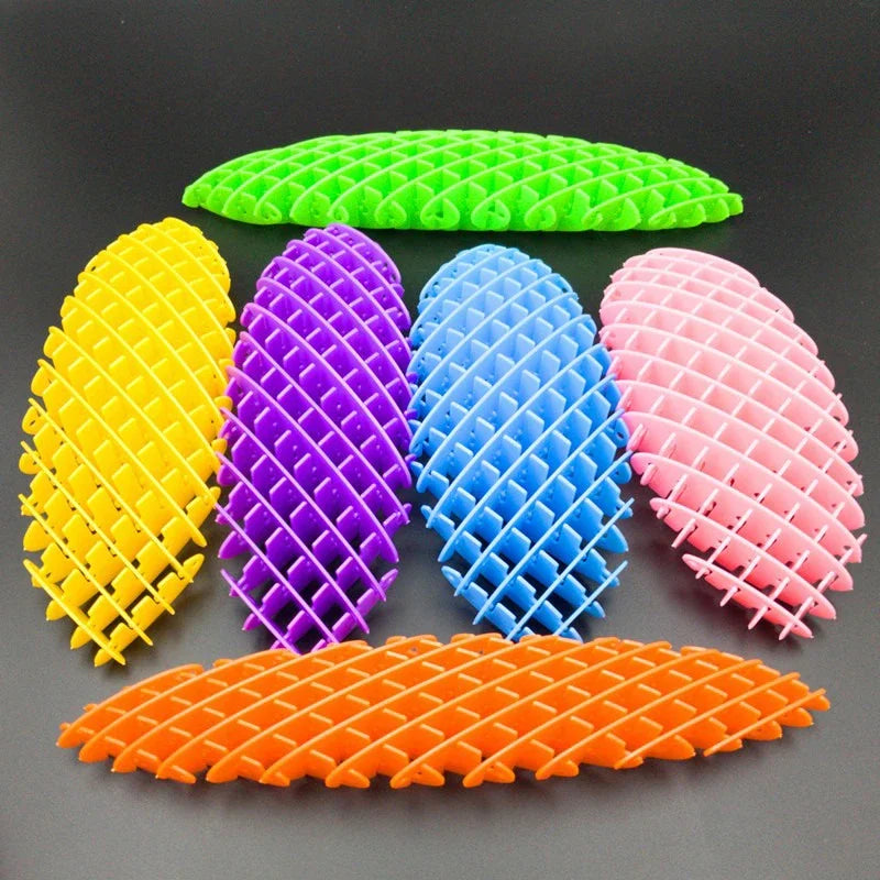 Colección de juguetes antiestrés flexibles 3D en forma de gusano, en colores amarillo, morado, azul y rosa.
