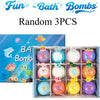 A box of random 3 pieces of bath bombs, including various colored fizzies and spheres.