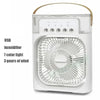 A white personal air cooler fan and humidifier with a light feature.