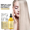A woman applies a yellow plant extract hair oil to her hair, demonstrating the 99% plant extract Bloom Hair Oil.