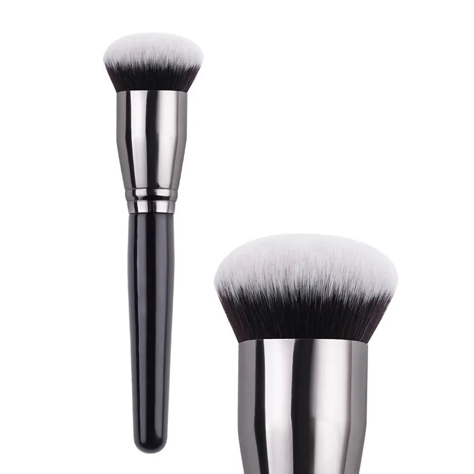 A pair of professional makeup brushes with silver handles and fluffy black bristles.