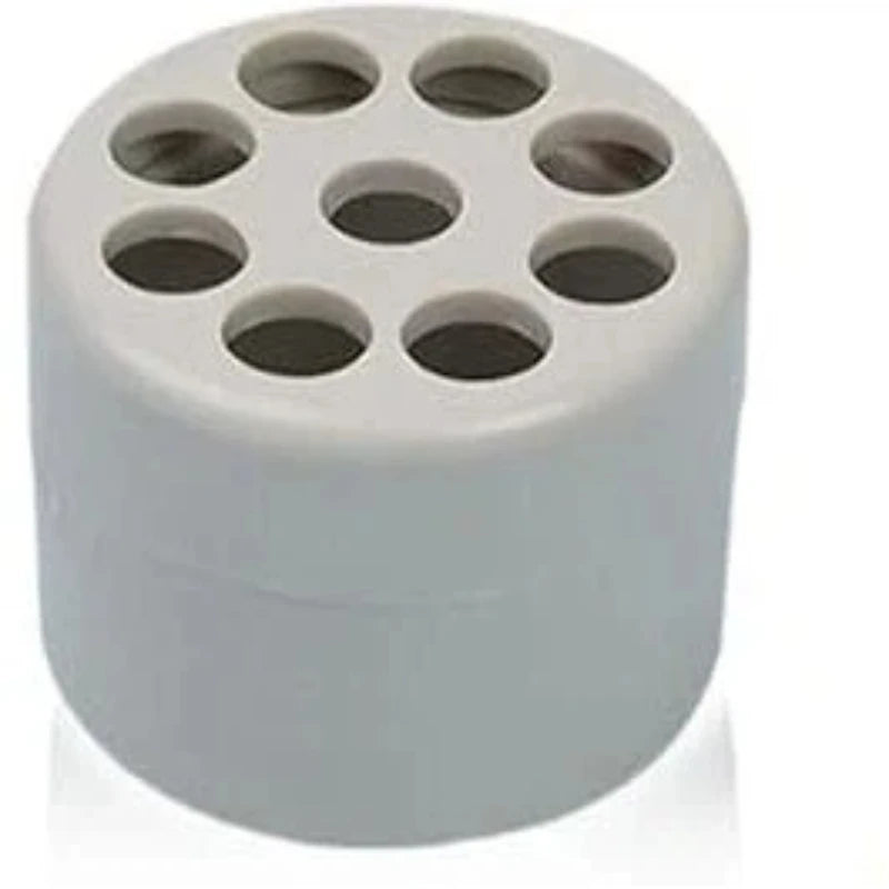 A white silicone spiral flower arrangement holder with multiple circular openings for arranging flowers.