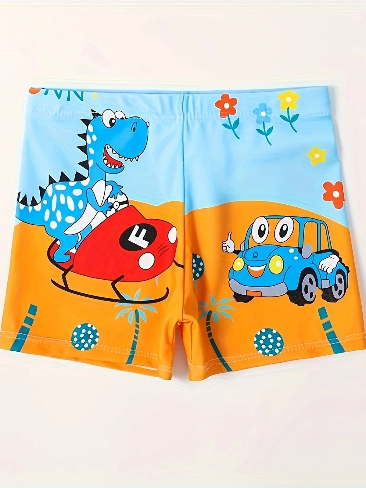 Boys' quick-dry dinosaur swim trunks featuring a blue dinosaur and a blue car on an orange background