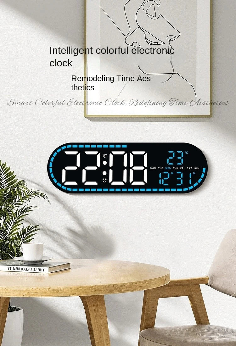 A large digital wall clock displaying time, date, and temperature on a white wall.