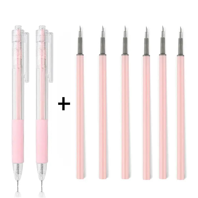Set de seis cuchillas de precisión para manualidades en tonos rosa, con hojas de repuesto.