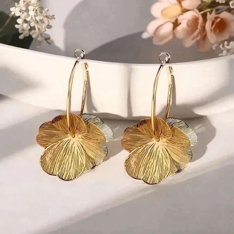 Golden double-layer hollow flower hoop earrings with gold and silver leaves