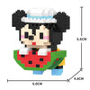 A black and white animal figurine built from micro building blocks, featuring a watermelon body and a white top.