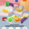 A set of colorful, plastic food items including a shrimp, cabbage, carrot, and eggplant for simulated food learning cognition