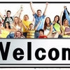 A group of diverse young women cheering and smiling in front of the text Welcome