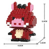 A red pig figurine made of LEGO bricks, showing its size and detail.
