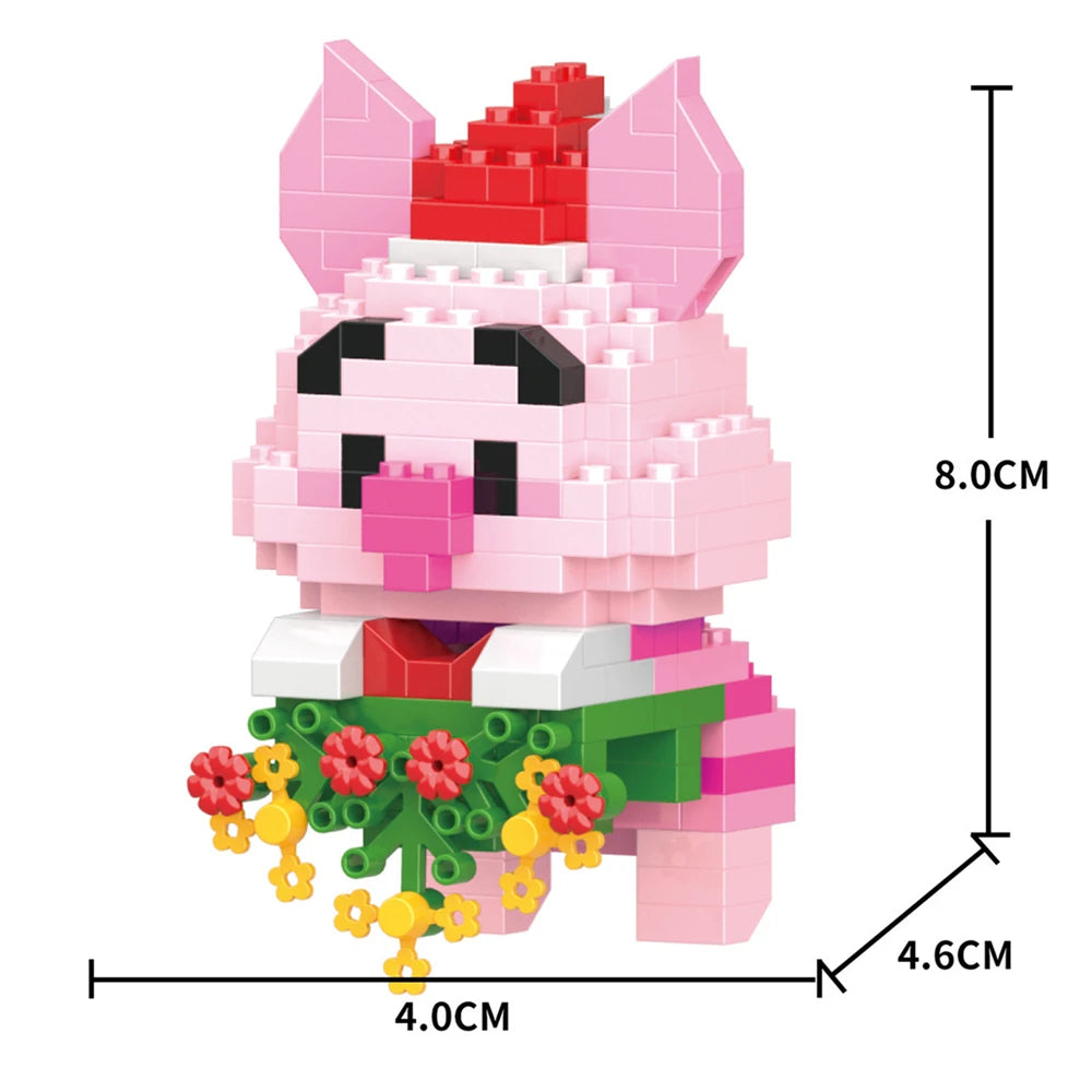 A pink pig figurine made of micro building blocks with a red hat and green accents.