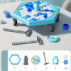 A blue and white penguin ice rescue game set featuring a hexagonal board, wooden pieces, and a clock.