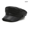 A black PU leather beret hat with an adjustable fit shown from the side.