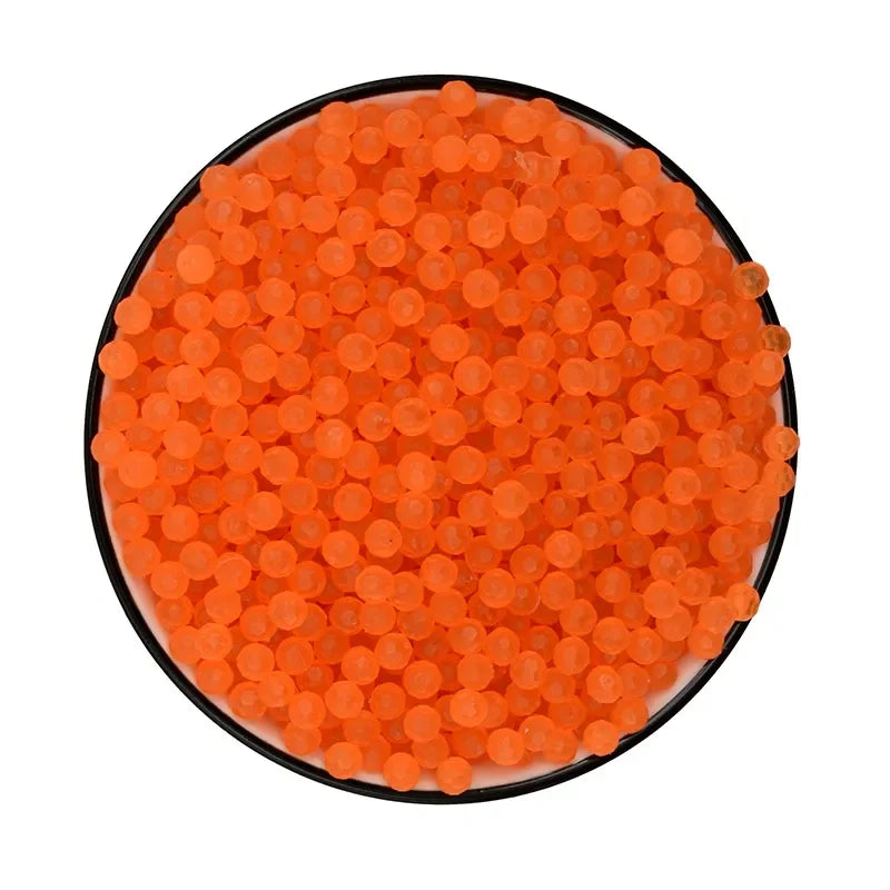 A circular display of 300 orange water beads in a refill pack.