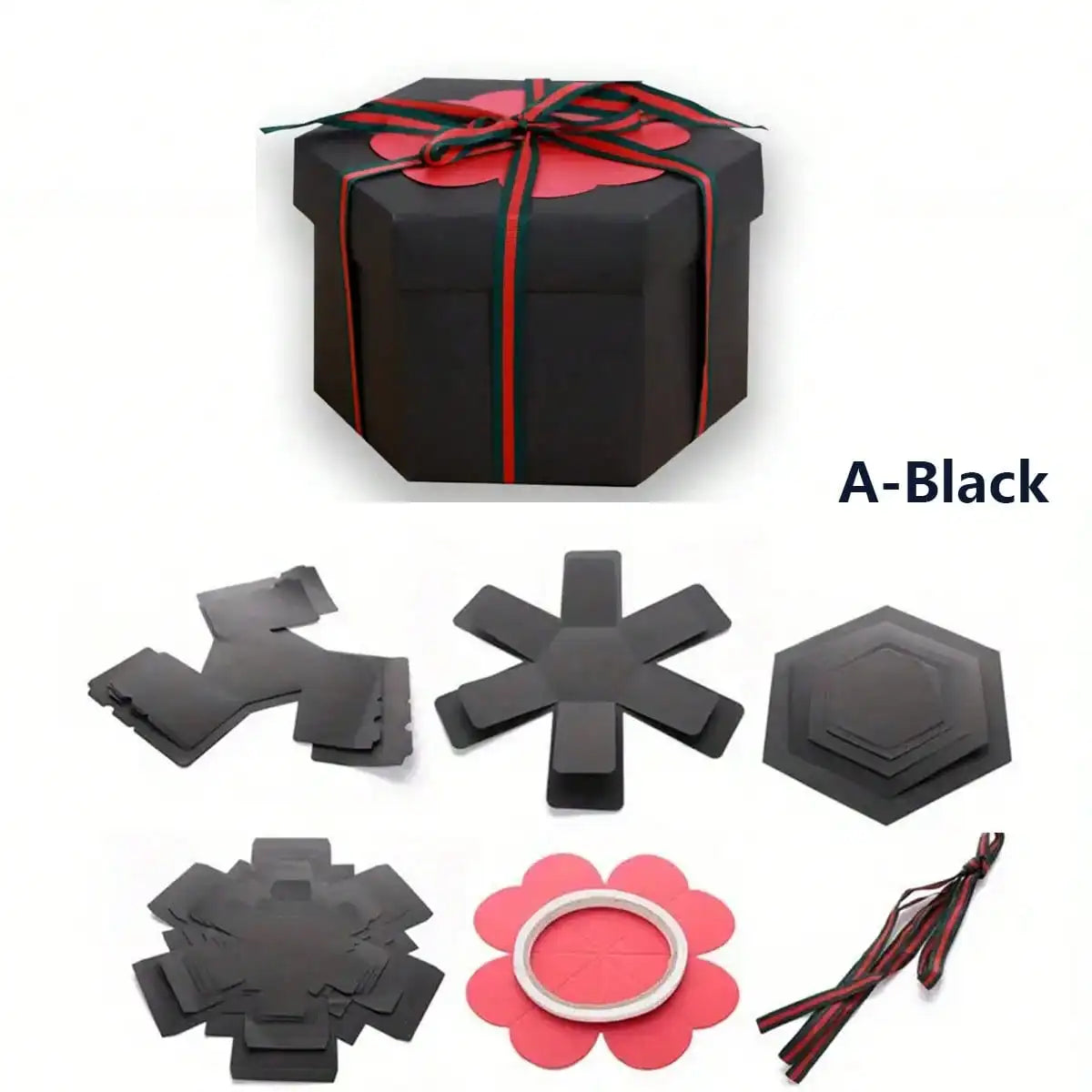 A black gift box kit with red ribbon and accompanying explosion surprise elements.