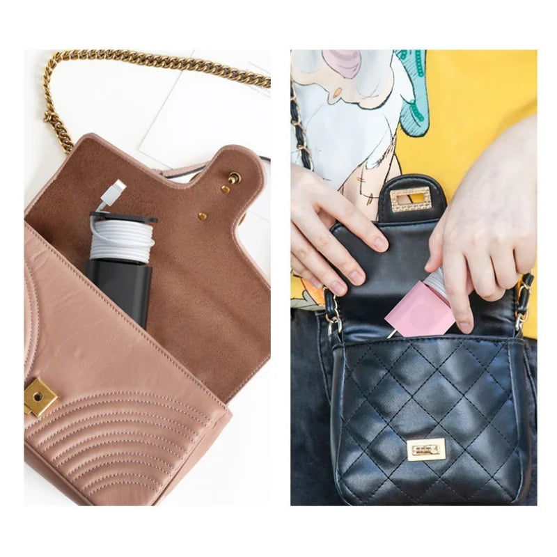 A close-up of a brown leather organizer pouch and a black quilted fabric pouch with a pink accent.