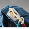 Blue knitted kids beach shorts with an elastic waist and a white tag visible.
