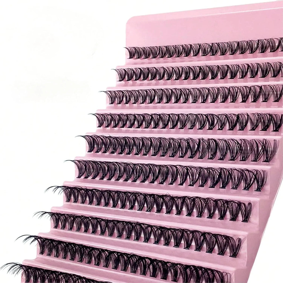 A display of pink false eyelashes arranged in multiple rows.