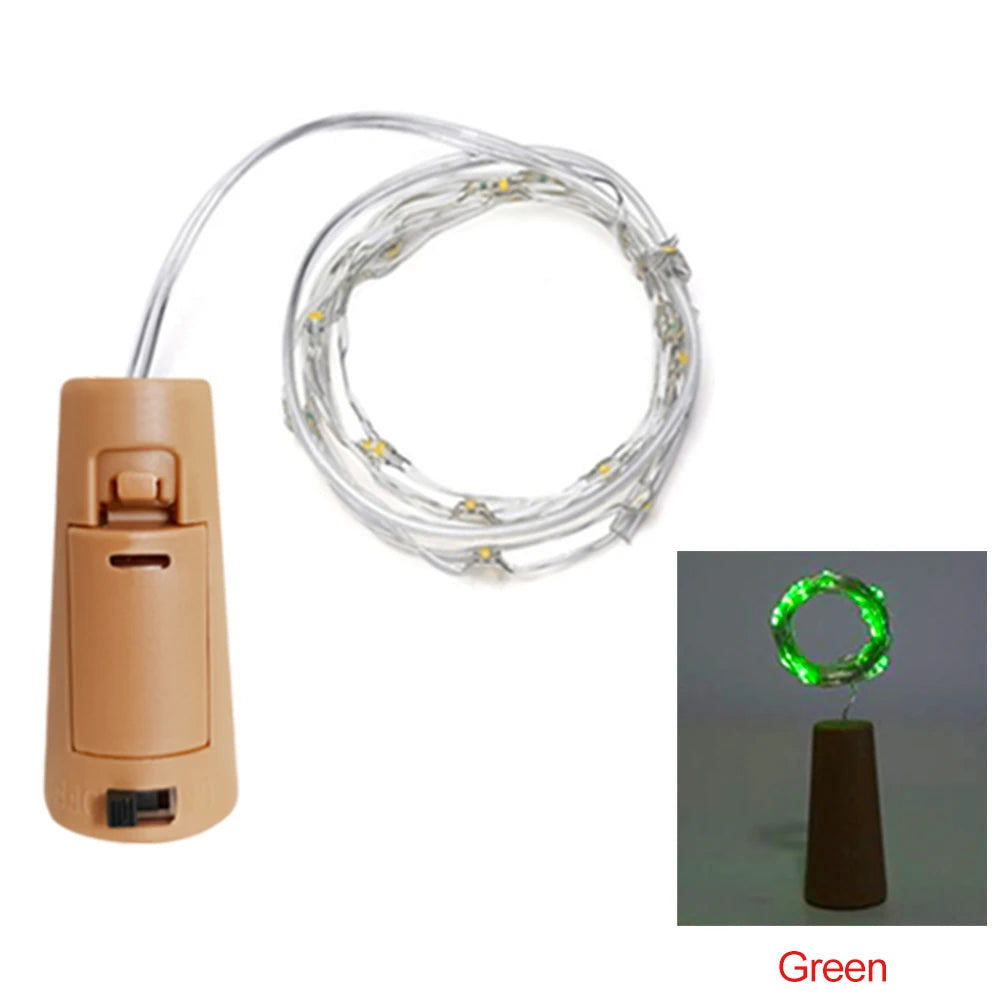 A roll of green LED fairy lights is shown with a connector and a small holder, demonstrating decorative string lights.