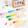 Wooden color matching puzzle for kids showing various wooden color blocks and a calendar display
