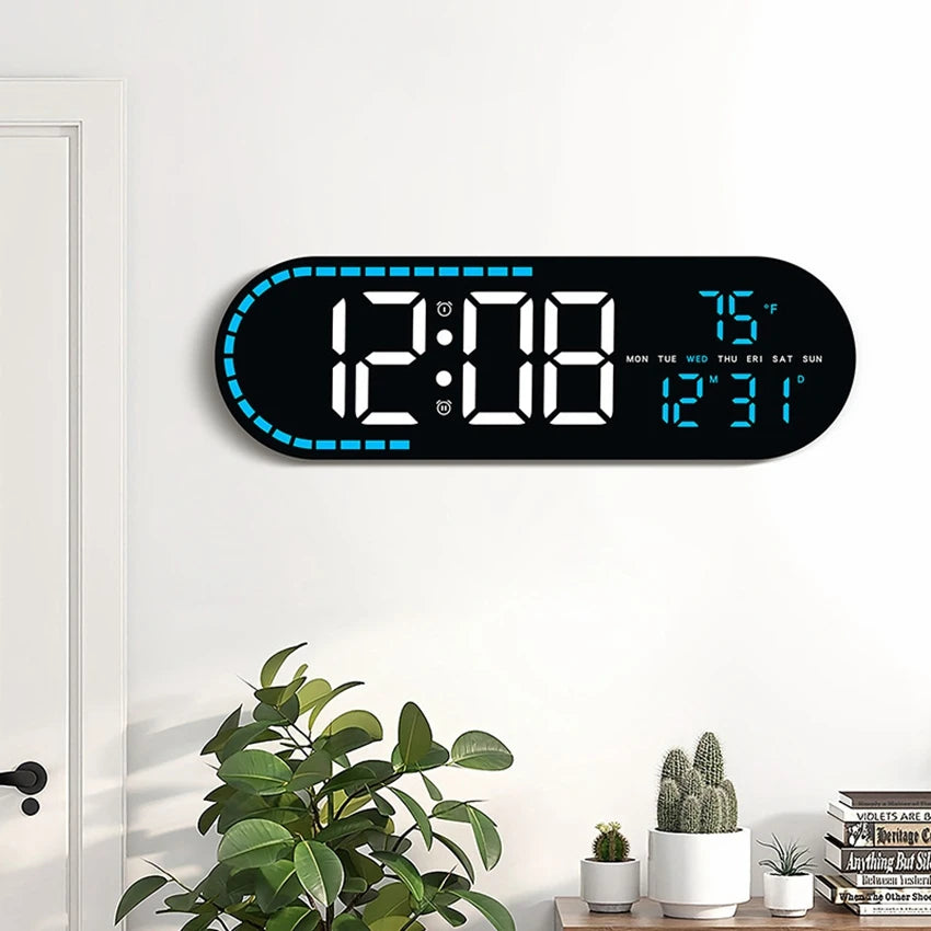 A large digital wall clock displaying the time 12:08, date, and temperature on a white wall.