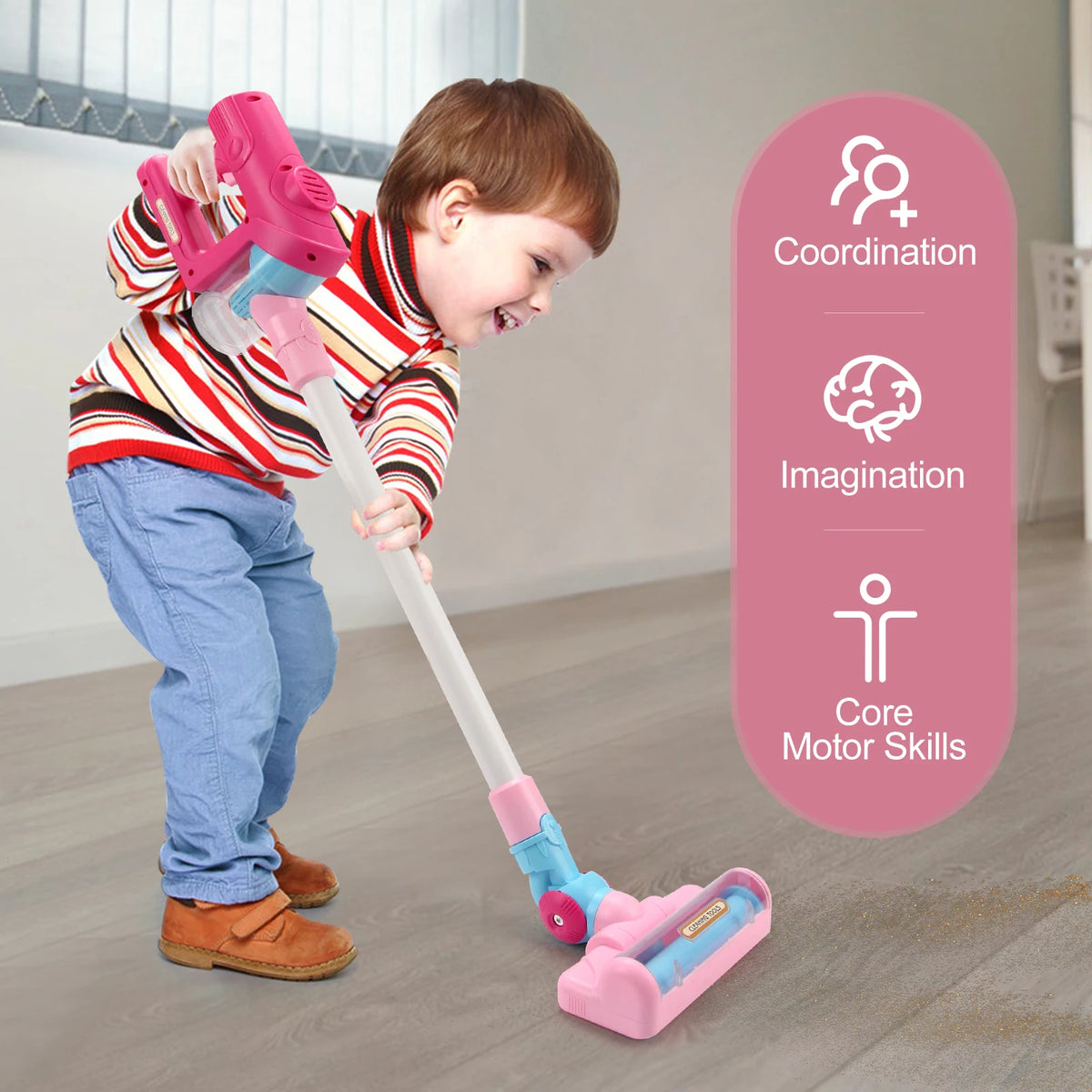 A young child is playing with a pink interactive toy vacuum cleaner on a floor, demonstrating coordination and imagination sk