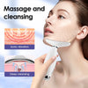 A woman is using a white LED light therapy neck and face massager for massage and cleansing.