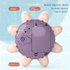 A purple suction device with a sensor and battery compartment is held in a hand, demonstrating its easy operation.