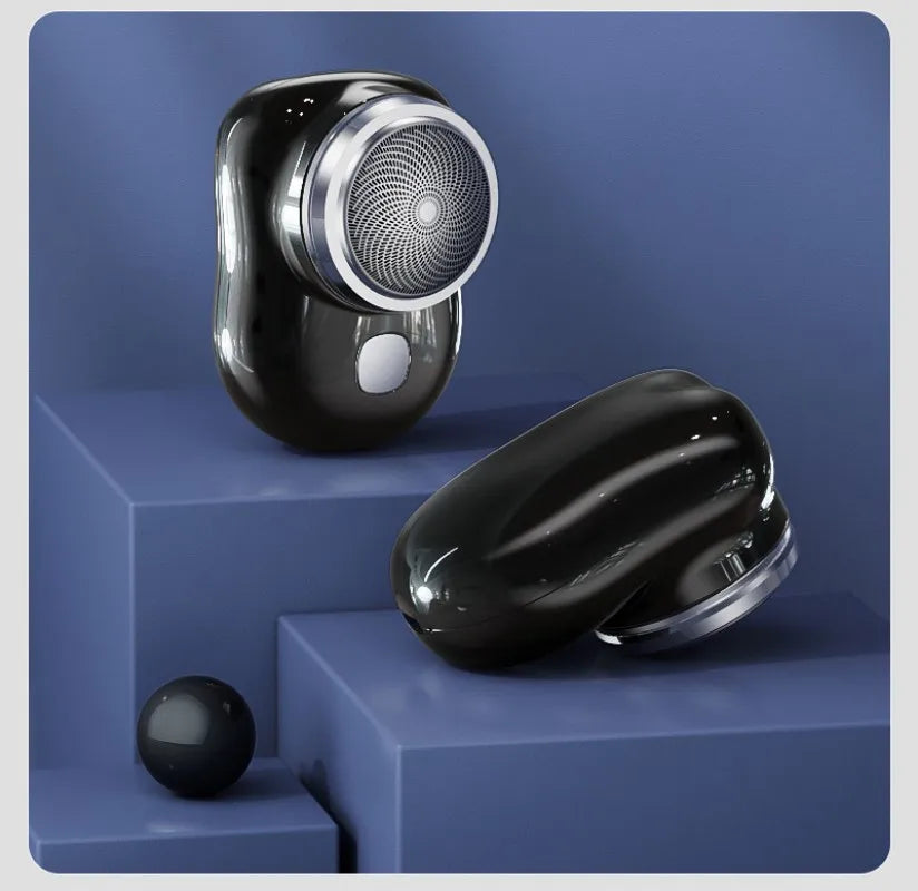 A black portable electric shaver with a silver shaving head is displayed on a blue background.