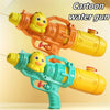 Two plastic toy water guns shaped like yellow cartoon ducks, one orange and one teal, ready for play.