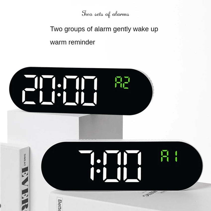 Two sets of alarms featuring digital displays, including a 20:00 alarm and a 7:00 alarm.