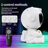 A white astronaut night light is shown next to a remote control and a button switch for two control methods.