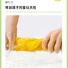 A hand is squeezing bright yellow liquid, likely a paint or dye, into a white surface.
