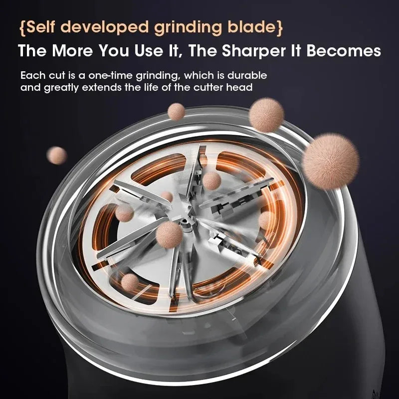 Close-up of a silver fabric shaver with a rotating blade mechanism inside, demonstrating the self-sharpening feature.