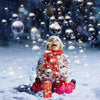 A child in winter clothing is laughing while surrounded by many soap bubbles on the snow.