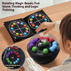 A child is interacting with a black puzzle ball featuring colorful beads, demonstrating the rotating magic beads for thinking