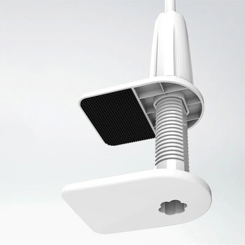 Soporte de teléfono flexible de cuello de cisne blanco con pinza acolchada sobre fondo gris claro.