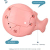 A pink musical whale bath toy with a thickened sealing ring and an automatic water absorption feature.