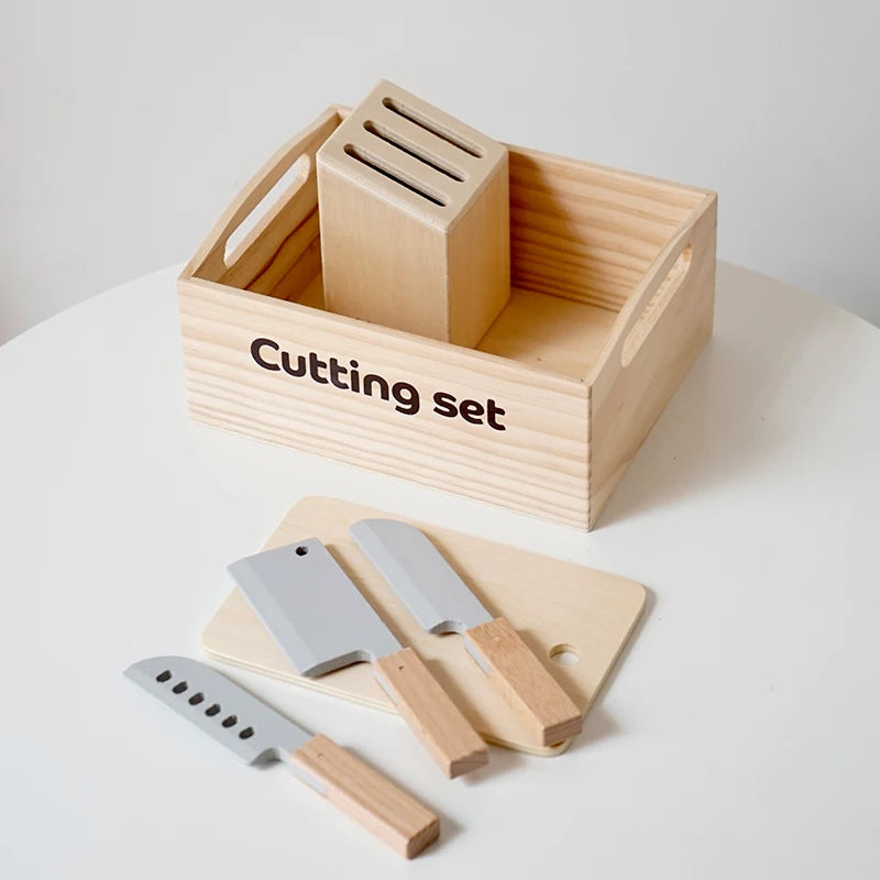 A wooden cutting set with a block-shaped knife and a larger blade is displayed in a wooden box.