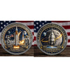 A commemorative space coin featuring the text We Went We Return and Artemis Program with imagery of rockets and the moon.