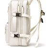 Sac à dos de voyage extensible blanc, avec sangle beige clair et boucles noires, vu de face.