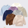 A collection of light colored knitted long-sleeve pullover sweaters in shades of blue, purple, beige, and gray.