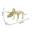 Kit de ensamblaje de esqueleto de dinosaurio detallado mostrando la estructura fósil completa.